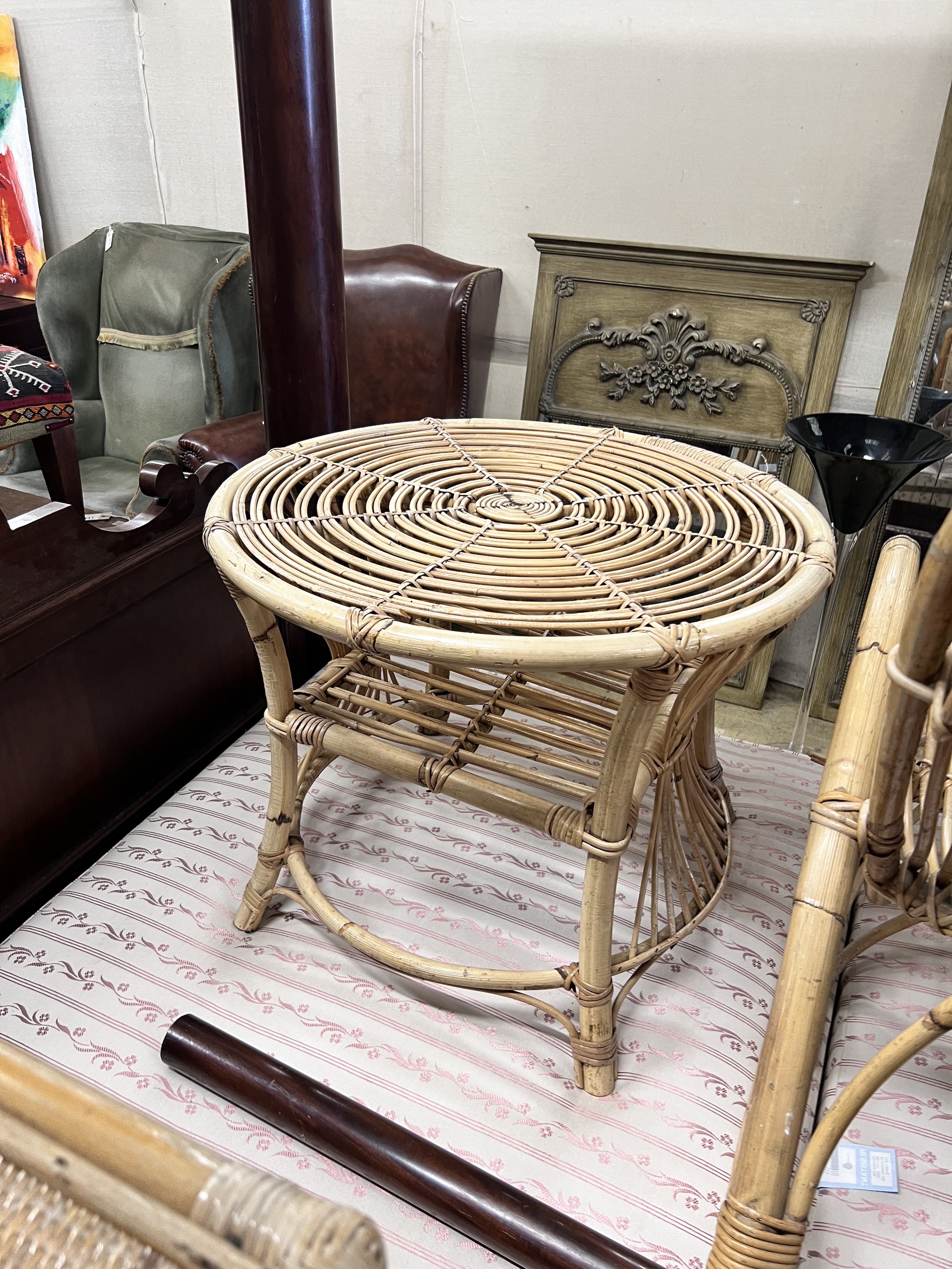 A Franco Albini rocking chair with coffee table, two side tables and a pair of plant stands